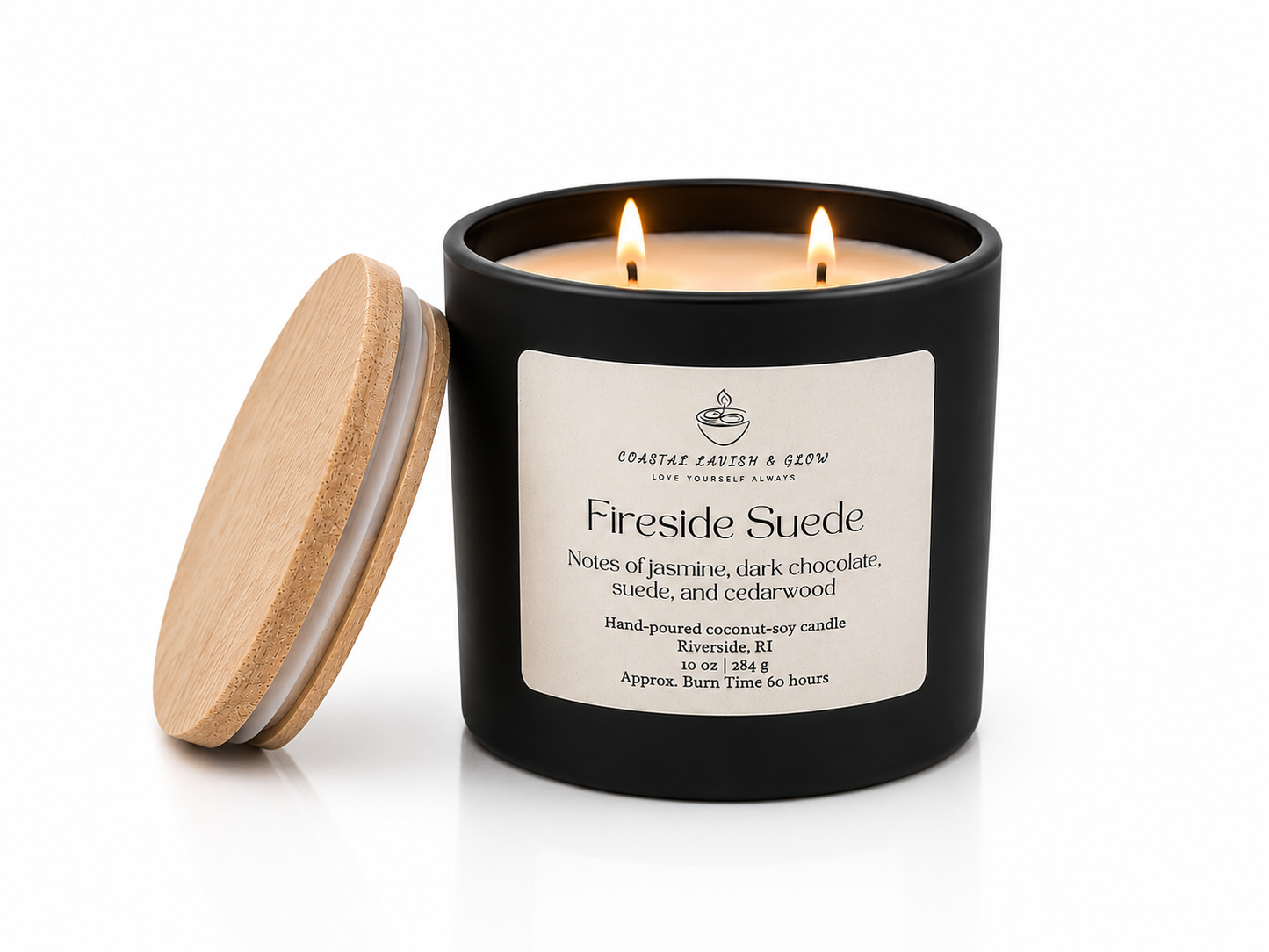 "Fireside Suede" black candle with a wooden lid and label on a white background