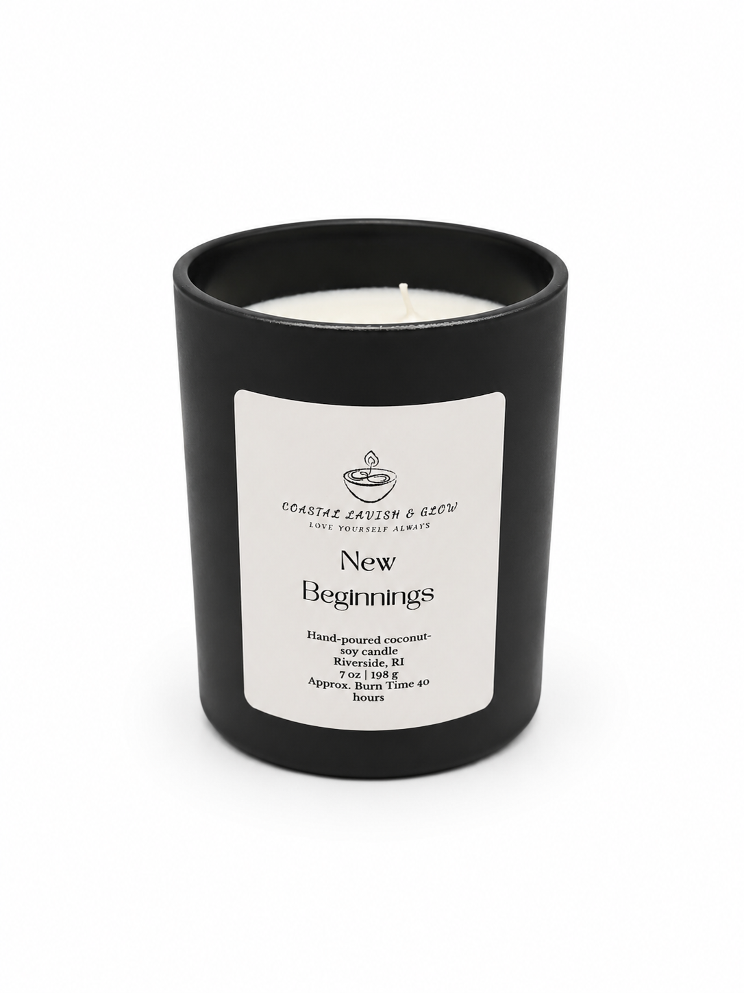 Black candle with a white label on a white background