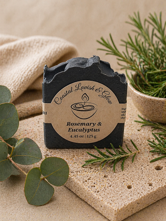 Rosemary & Eucalyptus Handcrafted Soap on a cream background with some greenery.