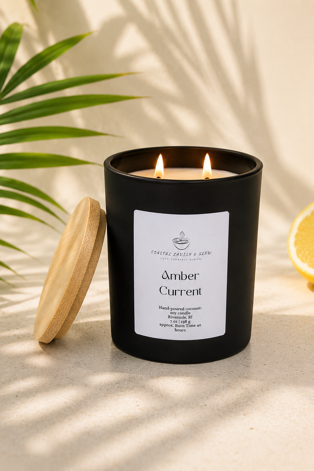 'Amber Current" scented candle with a wooden lid on a neutral background