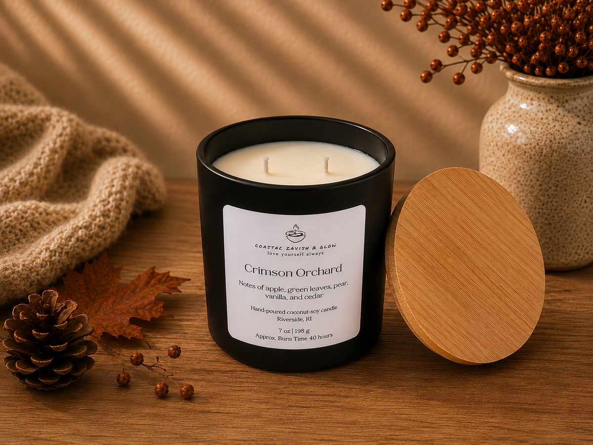 Candle labeled 'Crimson Orchard' with a wooden lid on a wooden surface.