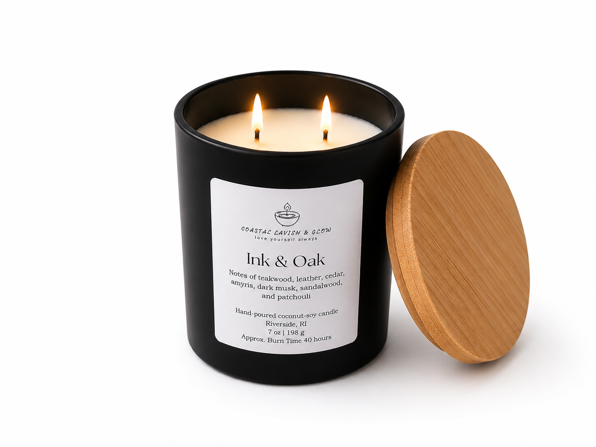 Candle in a black container with a wooden lid on a white background