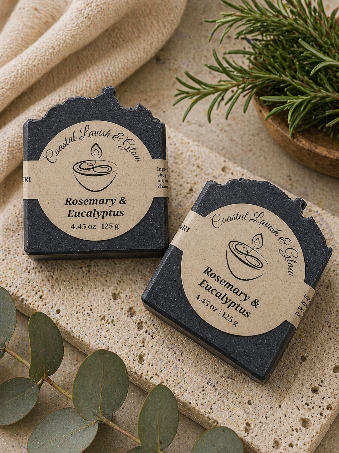 Rosemary & Eucalyptus Handcrafted Soap on a cream background with some greenery.