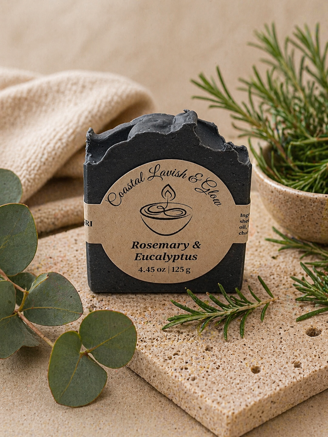 Rosemary & Eucalyptus Handcrafted Soap on a cream background with some greenery.