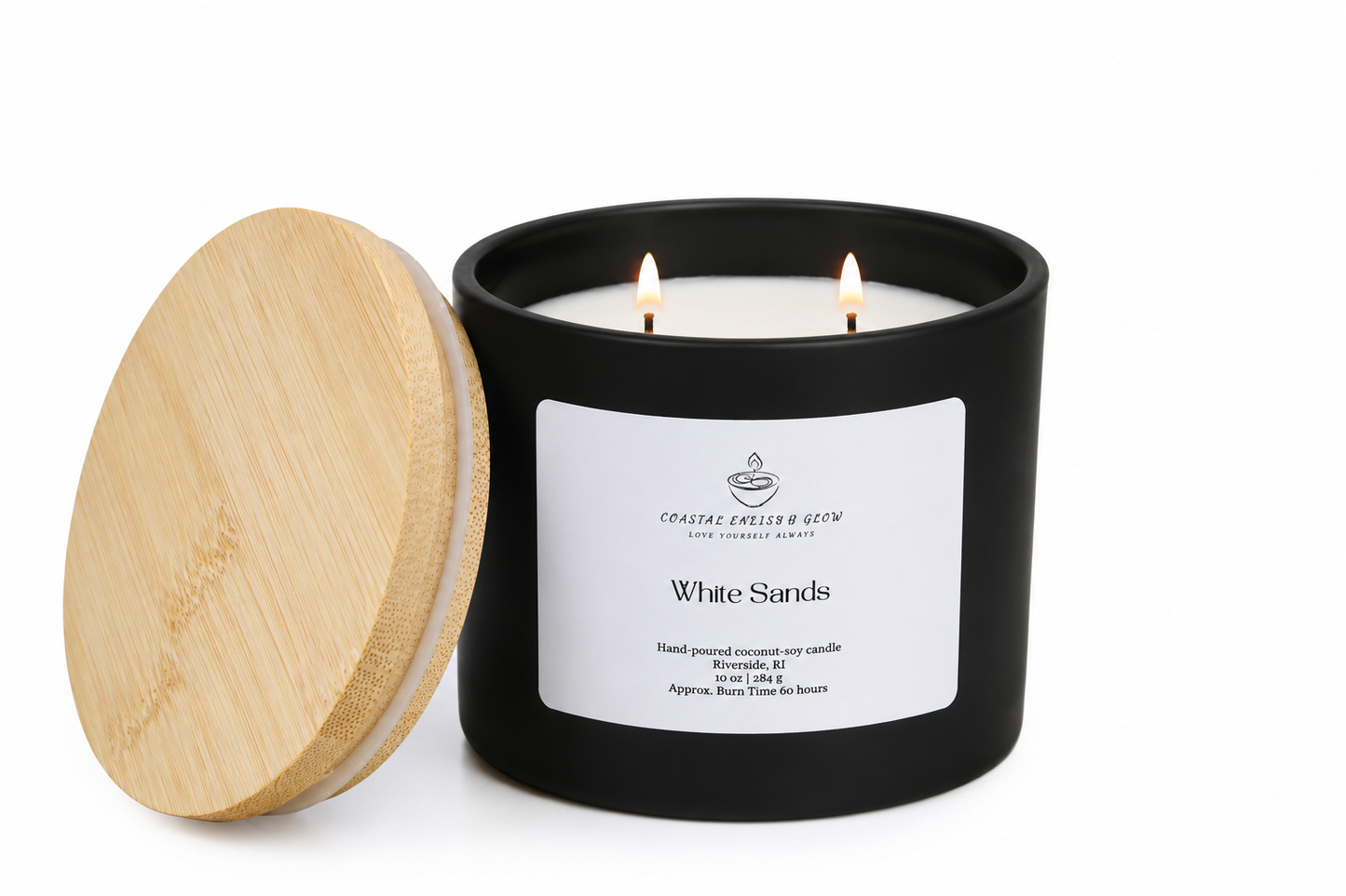 Black candle with wooden lid and 'White Sands' label on a white background
